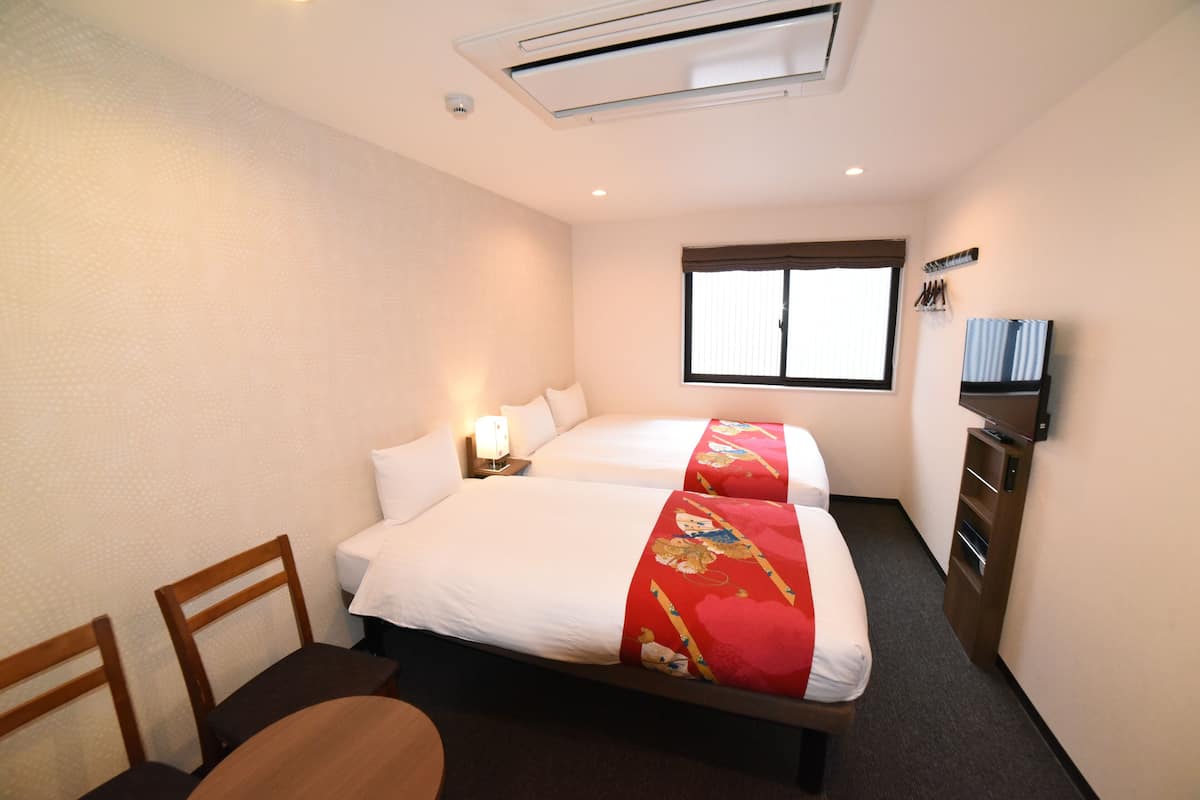 Premium bedding, down duvets, memory-foam beds, desk