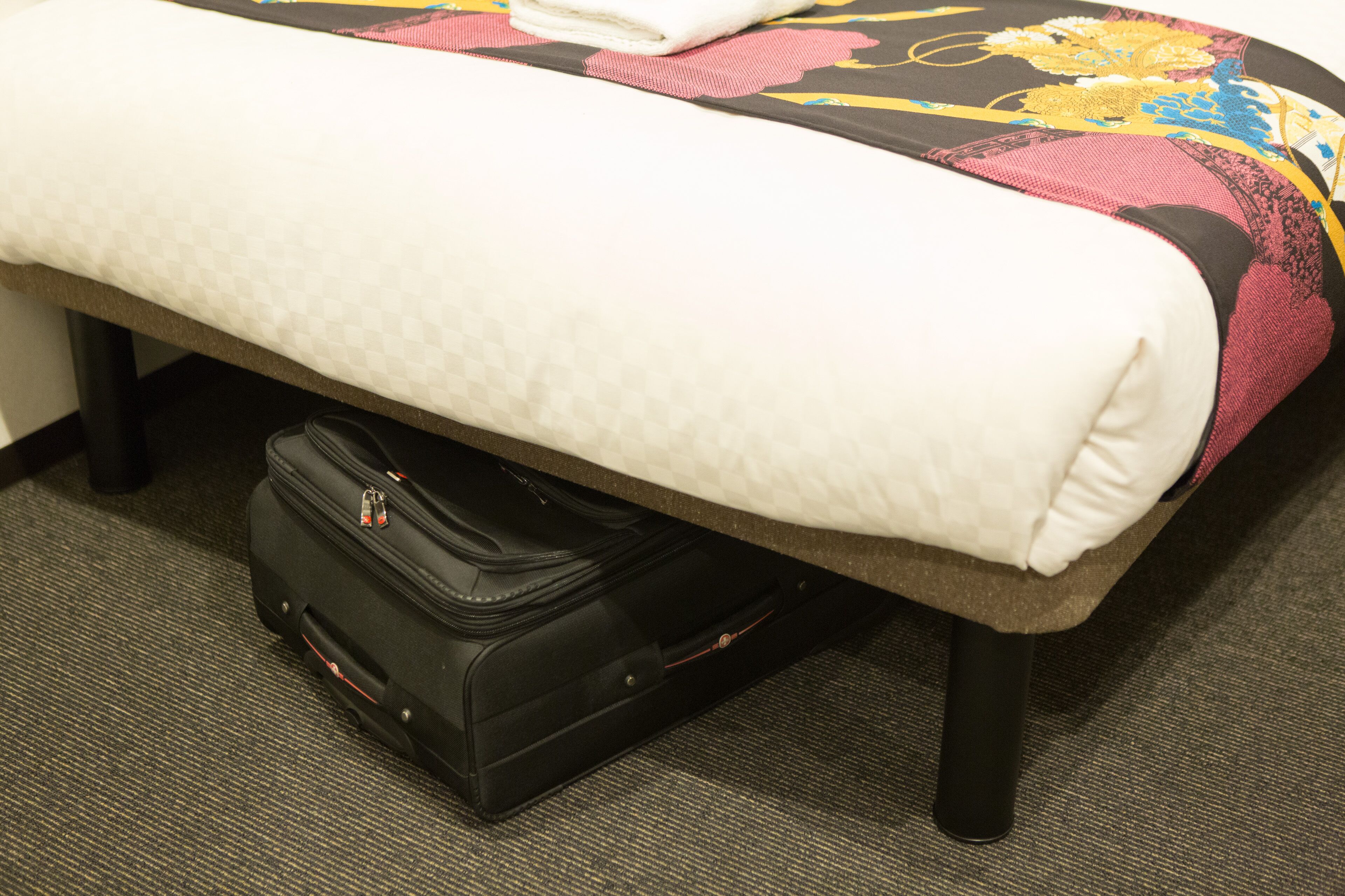 premium bedding, down duvets, memory-foam beds, desk