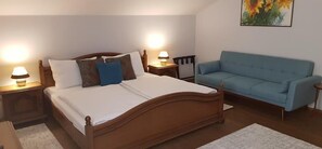 ห้องดีลักซ์ดับเบิล | มินิบาร์, โต๊ะทำงาน, Wi-Fi ฟรี, ผ้าปูที่นอน