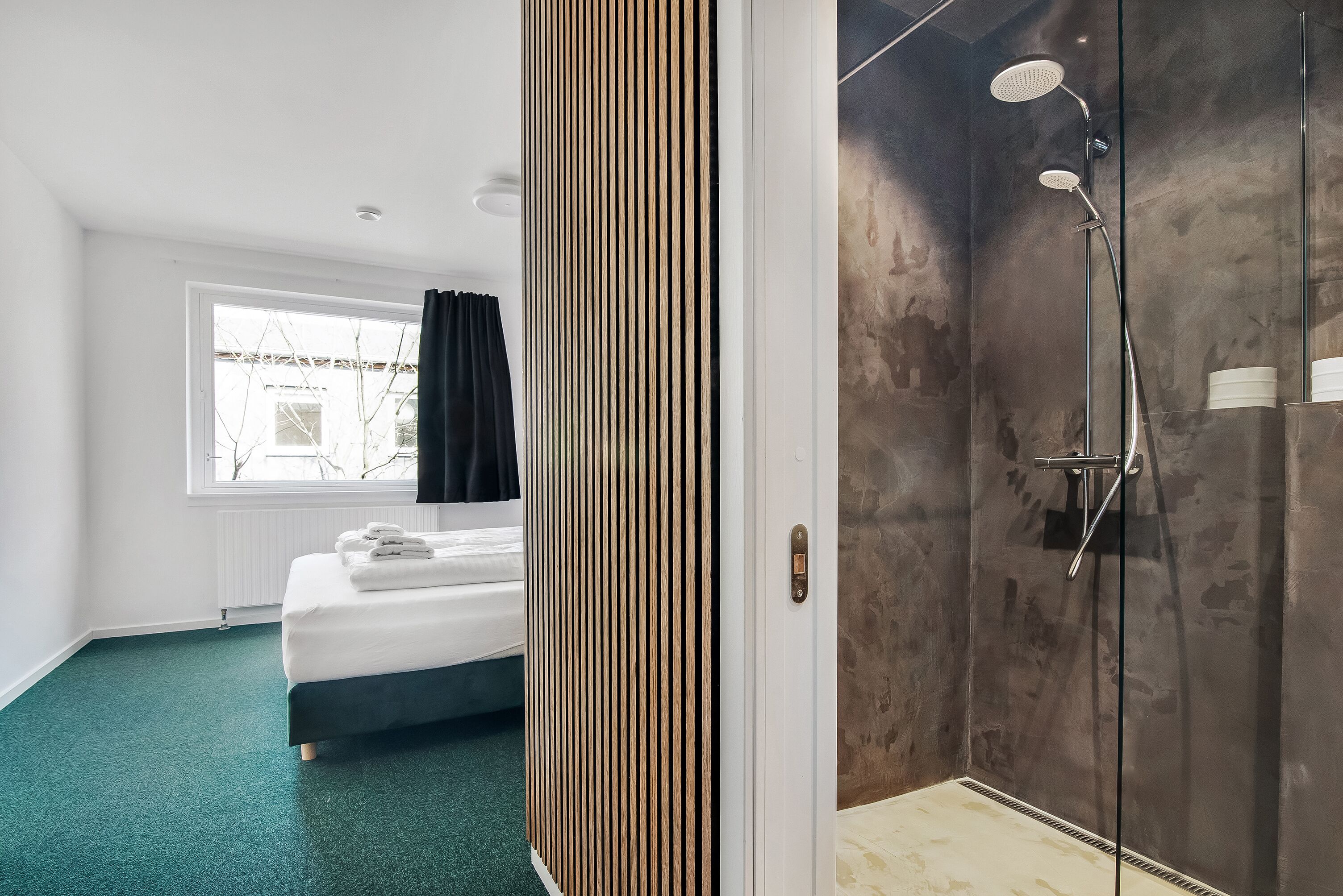standard double room | bathroom | shower, hair dryer, towels, soap