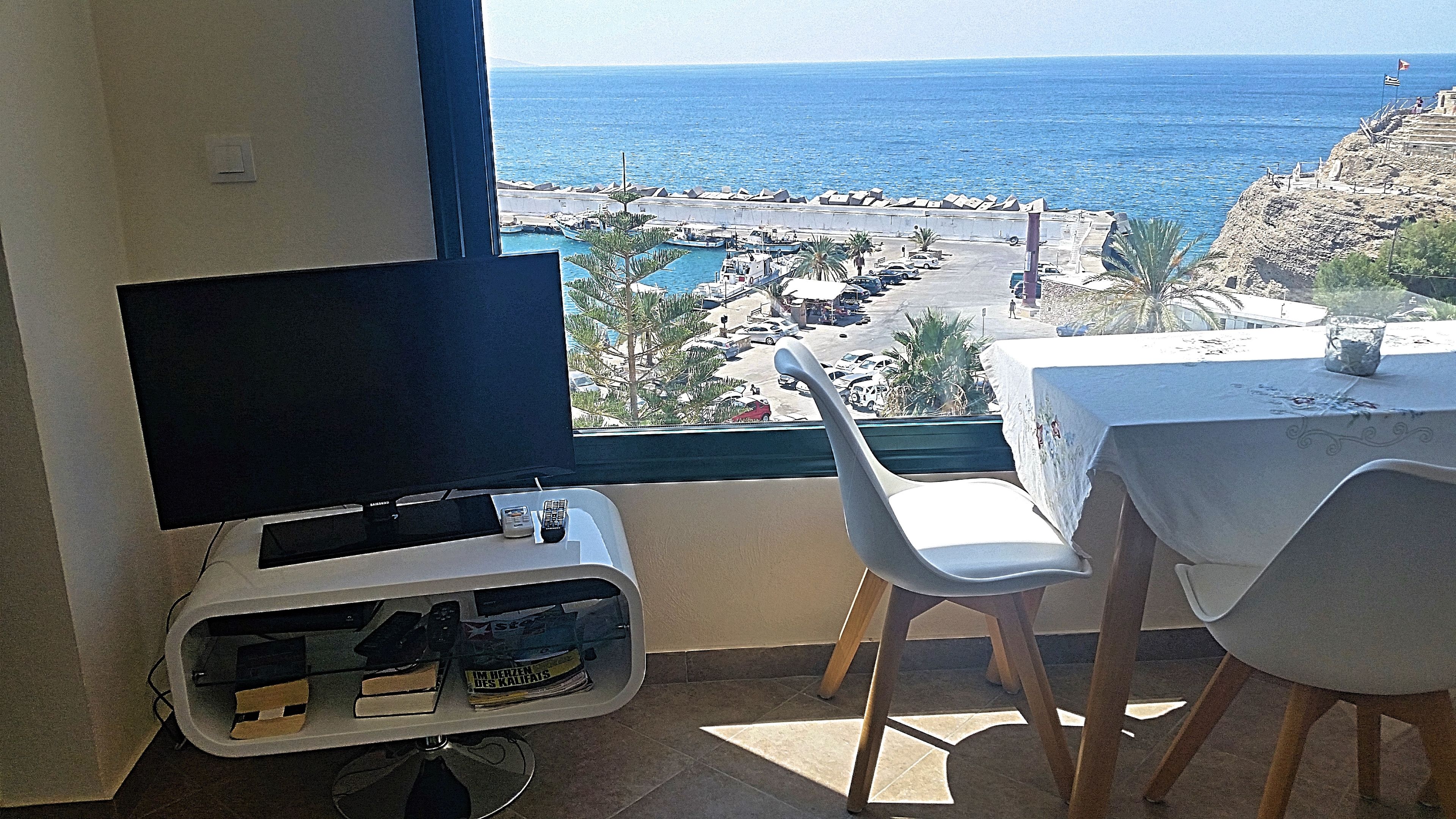 Apartment, 2 Bedrooms, Sea View | Living area | Flat-screen TV