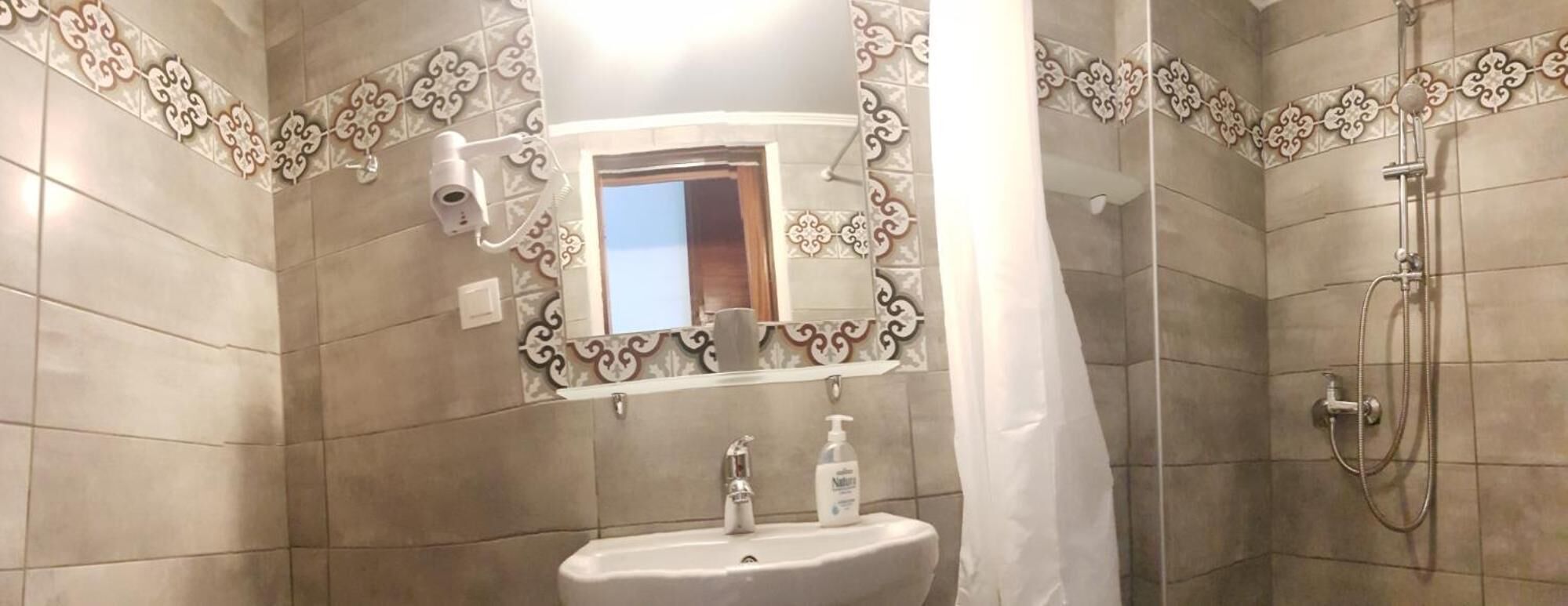 twin room, sea view | bathroom | shower, hair dryer, towels