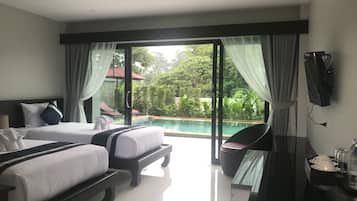 Standard-Zweibettzimmer | Zimmersafe, Schreibtisch, Verdunkelungsvorhänge, Zustellbetten