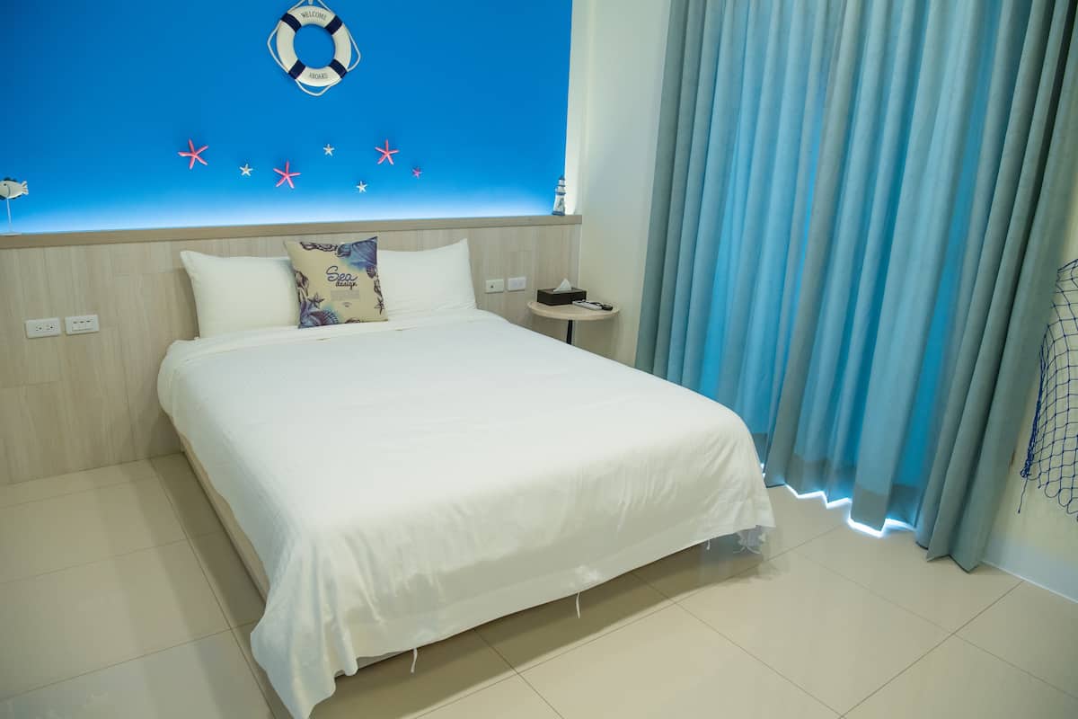 Deluxe-Vierbettzimmer | Verdunkelungsvorhänge, kostenloses WLAN, Bettwäsche