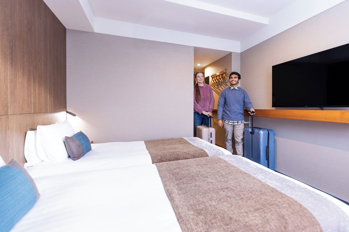 Comfort Twin kamer, niet-roken | Een kluis op de kamer, een bureau, verduisterende gordijnen, gratis wifi