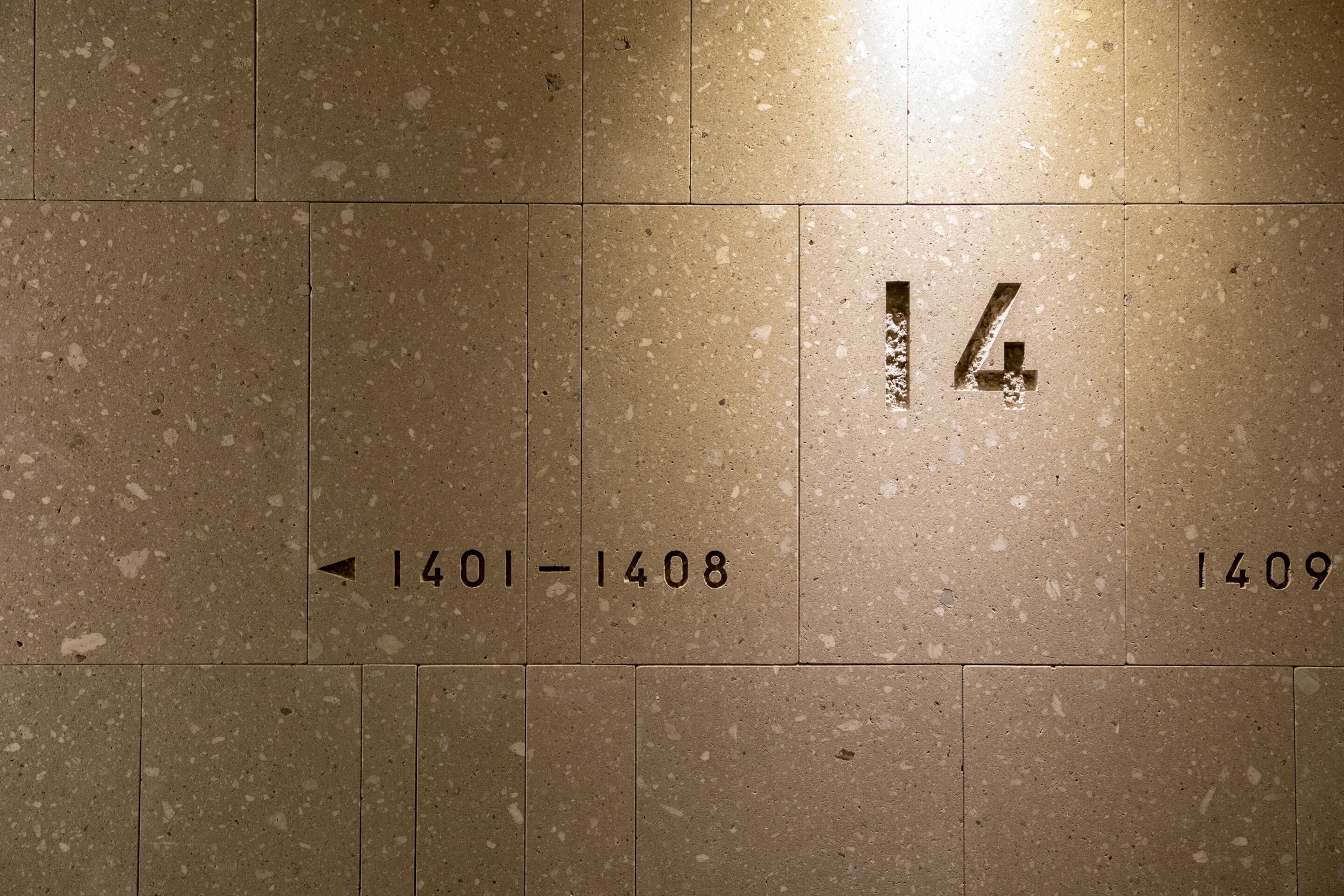 A floor with numbered tiles indicating room numbers 1401-1408 and 1409.