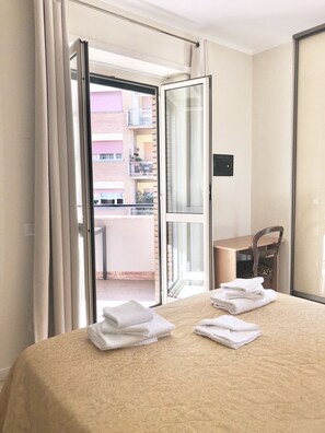 Premium bedding, in-room safe, desk, iron/ironing board