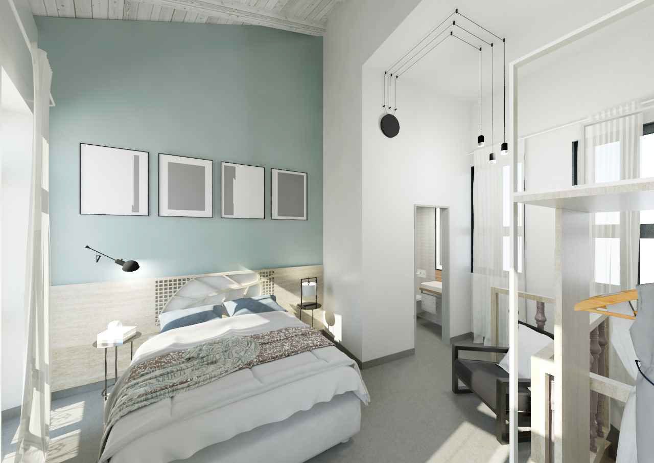 A modern bedroom with a large bed, bedside tables, a wardrobe, and a mirror.