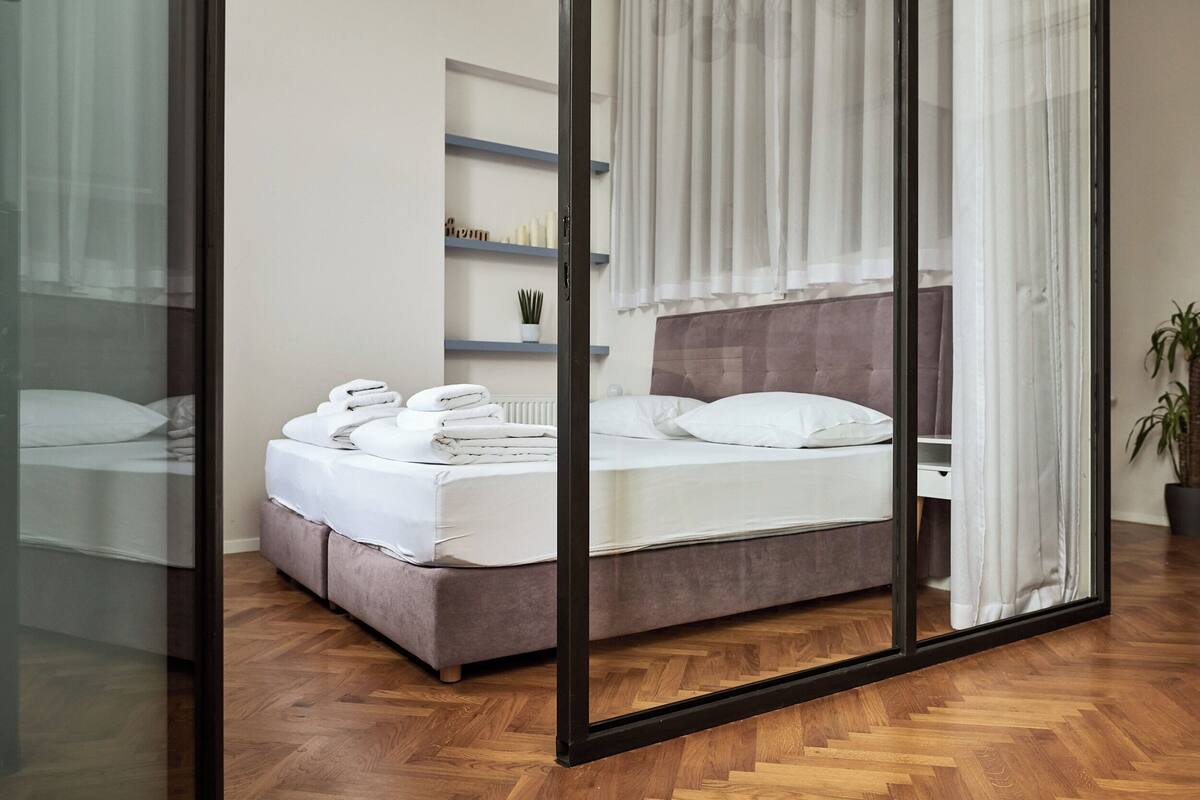 Appartement Deluxe | Couette en duvet d'oie, matelas mémoire de forme, chambres insonorisées