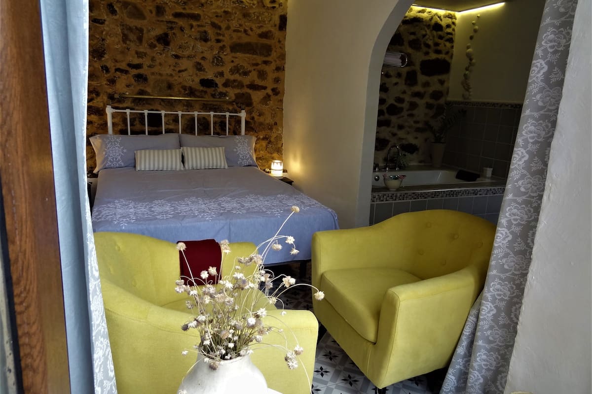 Honeymoon Suite, Patio, Garden Area | Minibar, individually decorated, individually furnished, desk