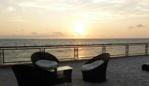 On the beach, sun loungers, beach umbrellas, beach towels