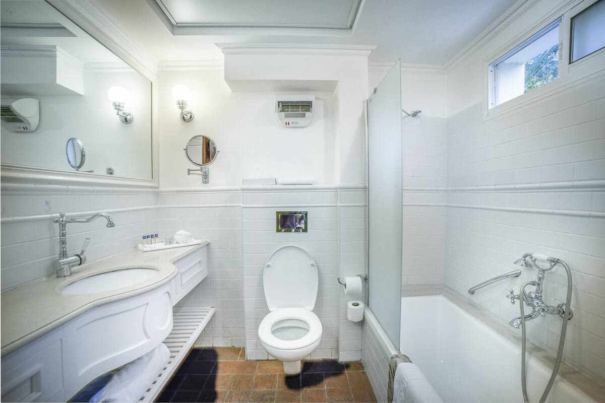 classic room, terrace, garden area | bathroom | separate bathtub and shower, free toiletries, hair dryer, bathrobes