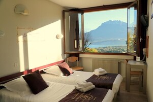 Desk, blackout curtains, free WiFi, bed sheets