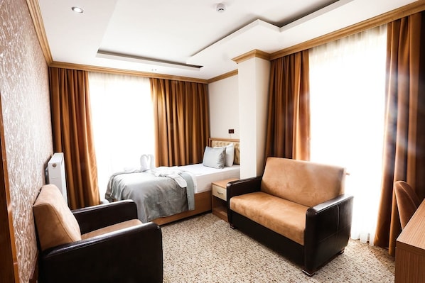 Ropa de cama de alta calidad y minibar