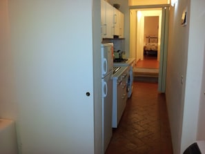 Apartment, 2 Bedrooms | Private kitchenette | Fridge, microwave, coffee/tea maker, cookware/dishes/utensils