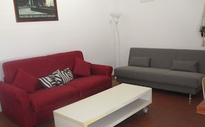 Apartment, 2 Bedrooms | Living area | TV