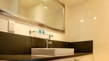 Shower, free toiletries, hair dryer, towels