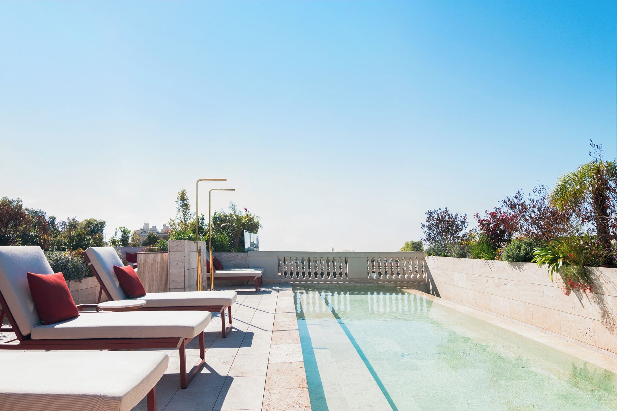 outdoor pool, pool umbrellas, pool loungers