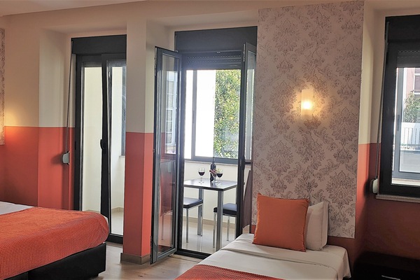 Family Suite, Private Bathroom | Desk, blackout drapes, soundproofing, iron/ironing board (on request)