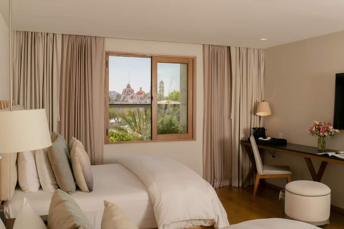 Premium bedding, down duvets, minibar, in-room safe
