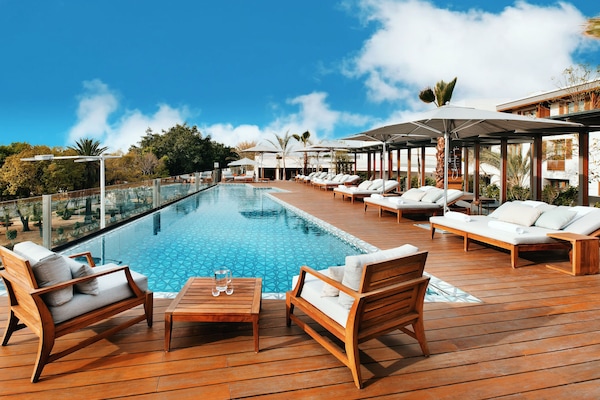 Outdoor pool, open 9:00 AM to 6:00 PM, pool umbrellas, sun loungers