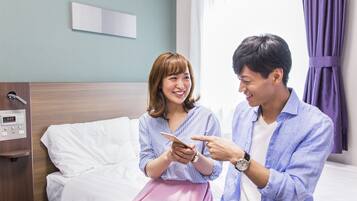 Premium bedding, desk, blackout curtains, soundproofing