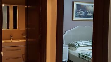 Blackout drapes, iron/ironing board, free WiFi, bed sheets