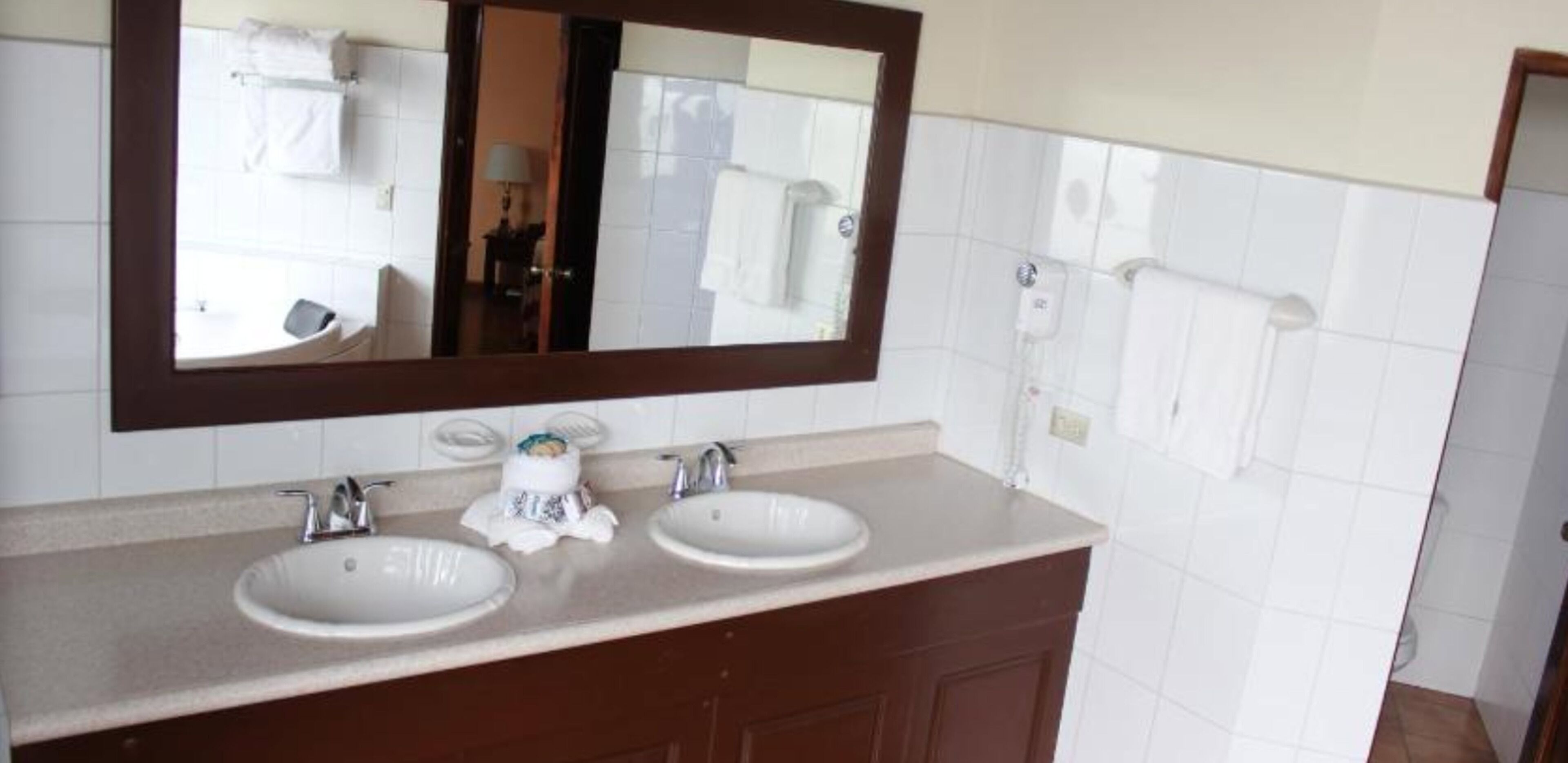 presidential suite, 1 king bed, hot tub | bathroom | free toiletries, hair dryer, towels