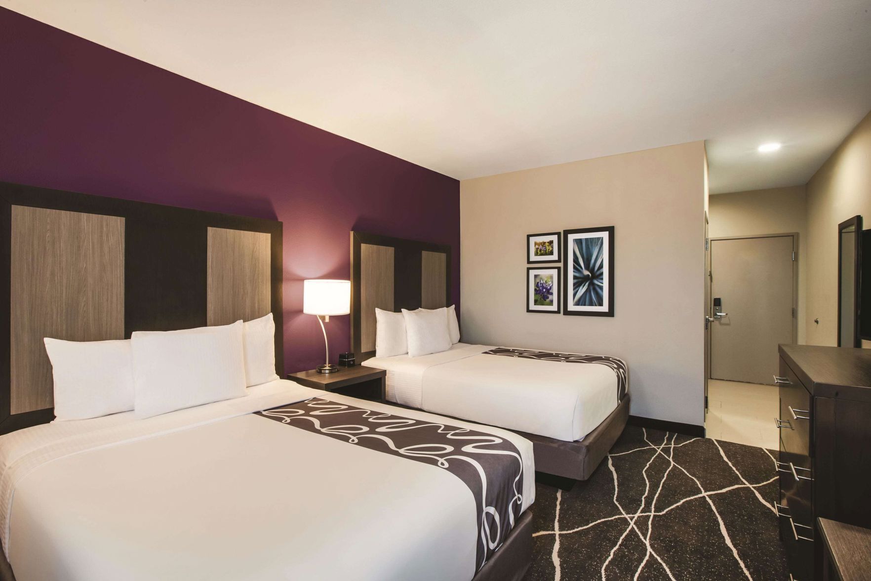 Premium bedding, desk, laptop workspace, iron/ironing board
