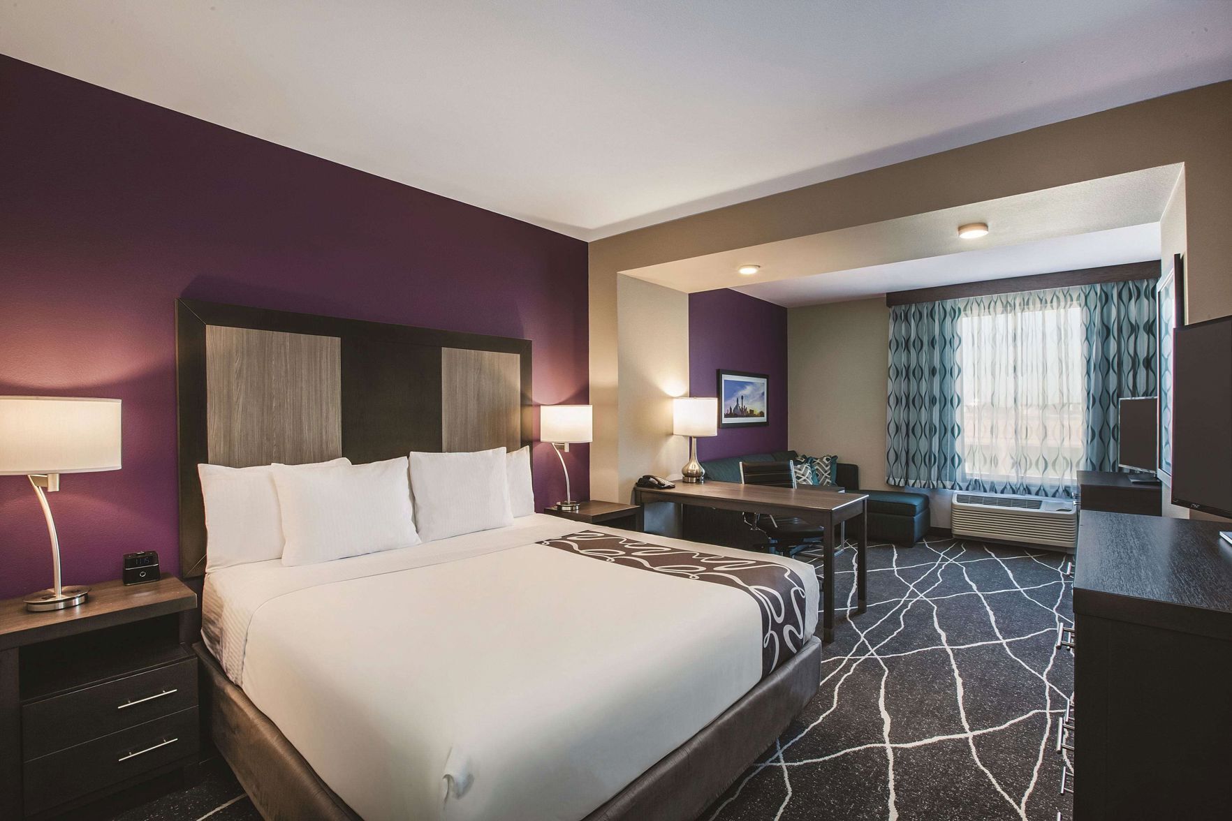 Premium bedding, desk, laptop workspace, iron/ironing board