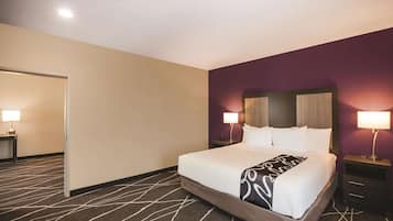 Premium bedding, desk, laptop workspace, iron/ironing board