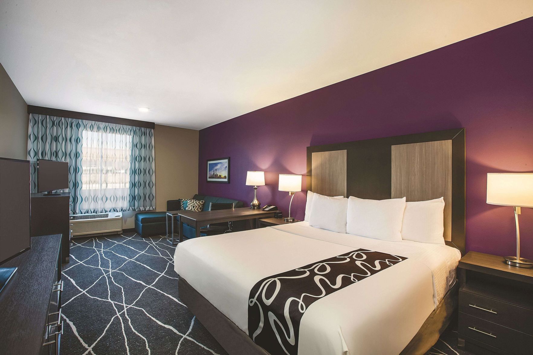 Premium bedding, desk, laptop workspace, iron/ironing board