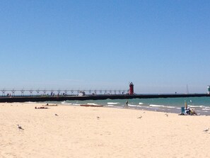 On the beach, sun-loungers