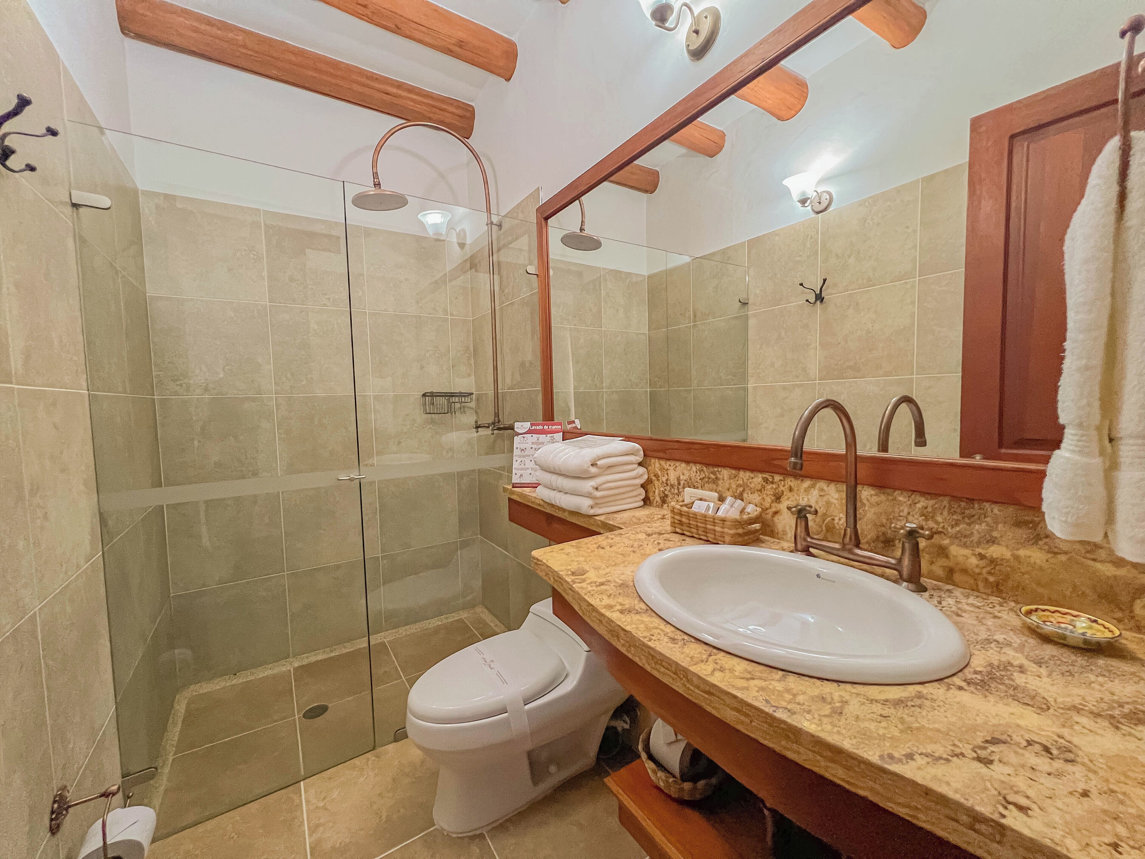 family suite | bathroom | shower, free toiletries, hair dryer, towels
