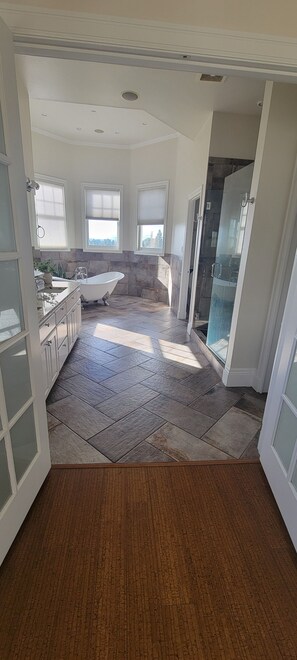 Combined shower/tub, hair dryer, towels, soap