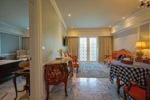Junior Suite | Living area | LCD TV - At Pingnakorn Riverside Hotel Chiangmai (Chiang Mai)