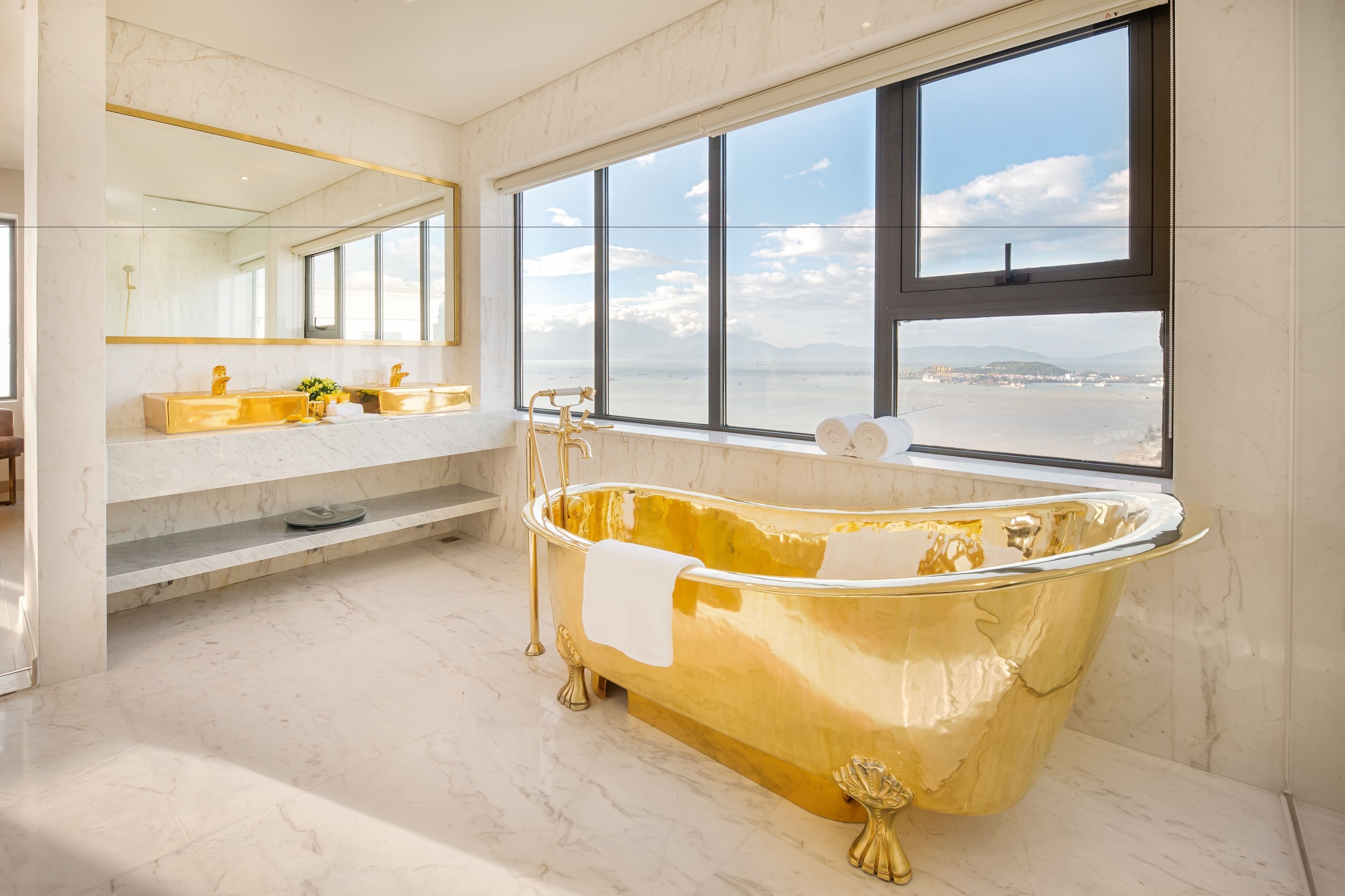presidential suite, club lounge access, bay view | bathroom | designer toiletries, hair dryer, bathrobes, slippers
