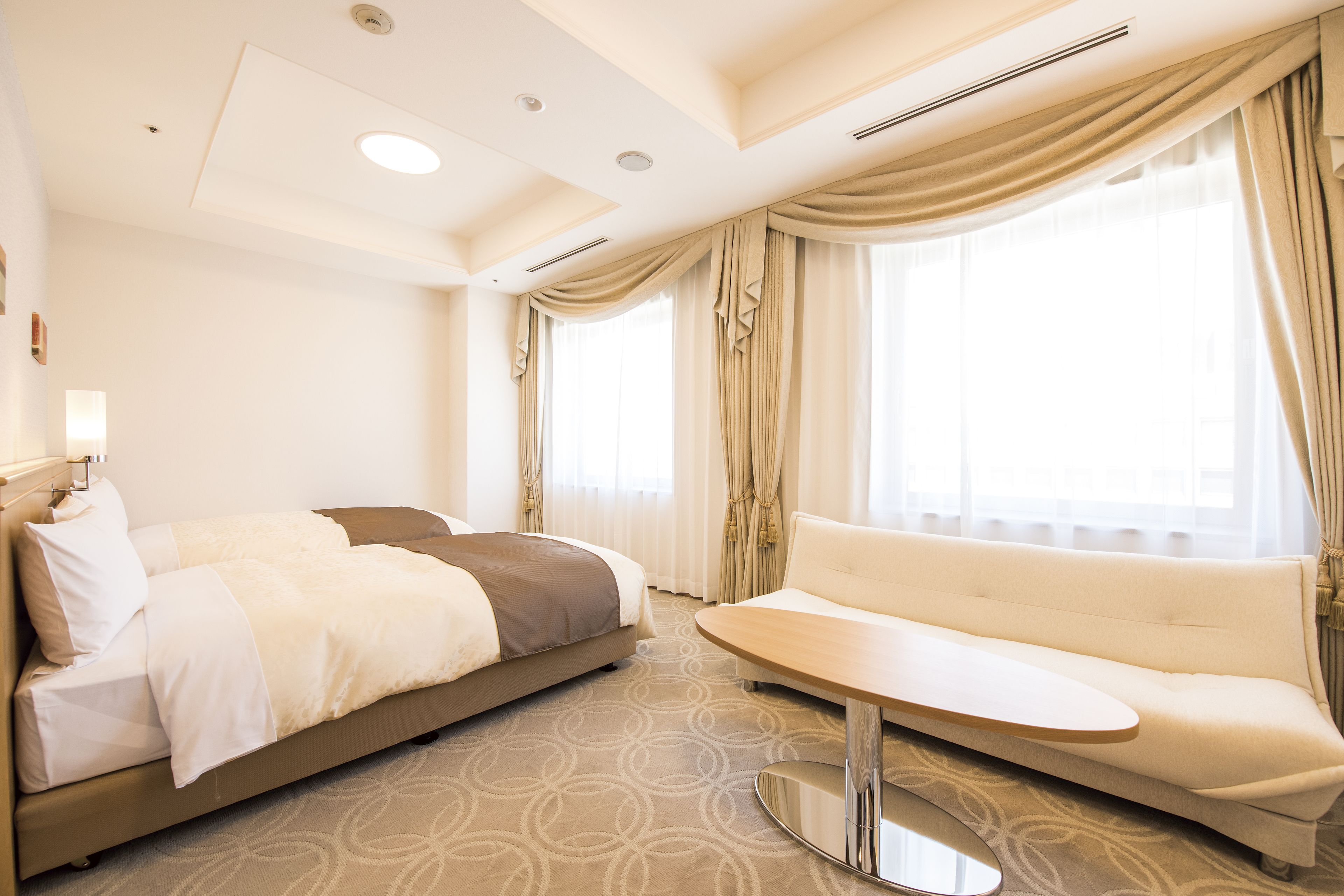 deluxe twin room | desk, free wifi, bed sheets