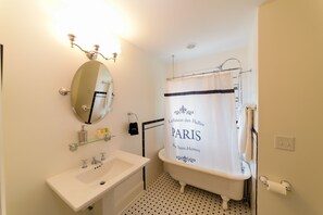 Combined shower/tub, hair dryer, towels, soap