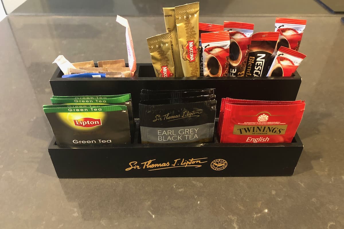 full-sized fridge, microwave, stovetop, coffee/tea maker