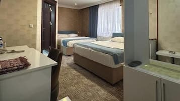 Standard Quadruple Room, 1 Bedroom, Ensuite, City View | 1 bedroom, in-room safe, desk, soundproofing