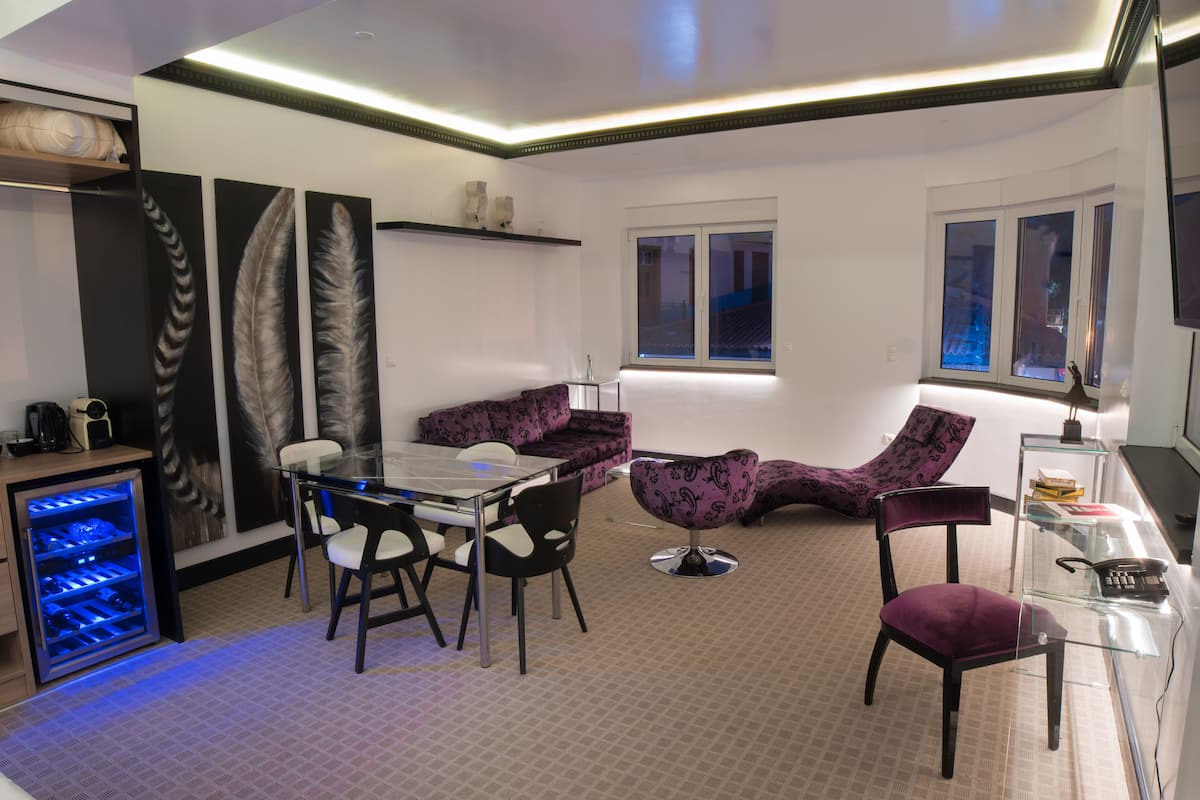Junior Suite | Living area | Flat-screen TV