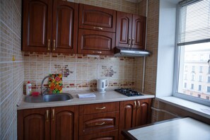 Apartment, 1 Bedroom | Private kitchen | Full-size fridge, microwave, electric kettle - Radogost (Minsk)