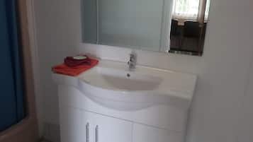 Shower, free toiletries, hair dryer, towels