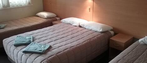 Desk, iron/ironing board, free wired internet, bed sheets