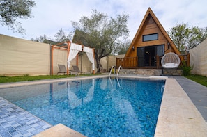 Seasonal outdoor pool, pool umbrellas, pool loungers