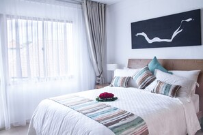 Apartment, 1 Bedroom | In-room safe, iron/ironing board, bed sheets - Jayakarta Residence (Legian)