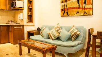 Apartment, 1 Bedroom | Living area | LCD TV, DVD player