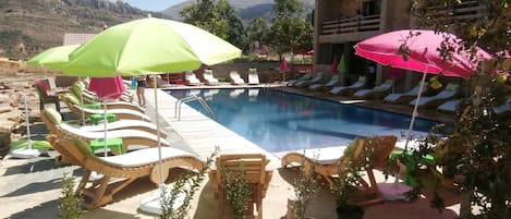 Seasonal outdoor pool, pool umbrellas, sun loungers