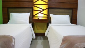 Dobbelt- eller tomannsrom | Skrivebord, strykejern/-brett, wi-fi (inkludert) og sengetøy